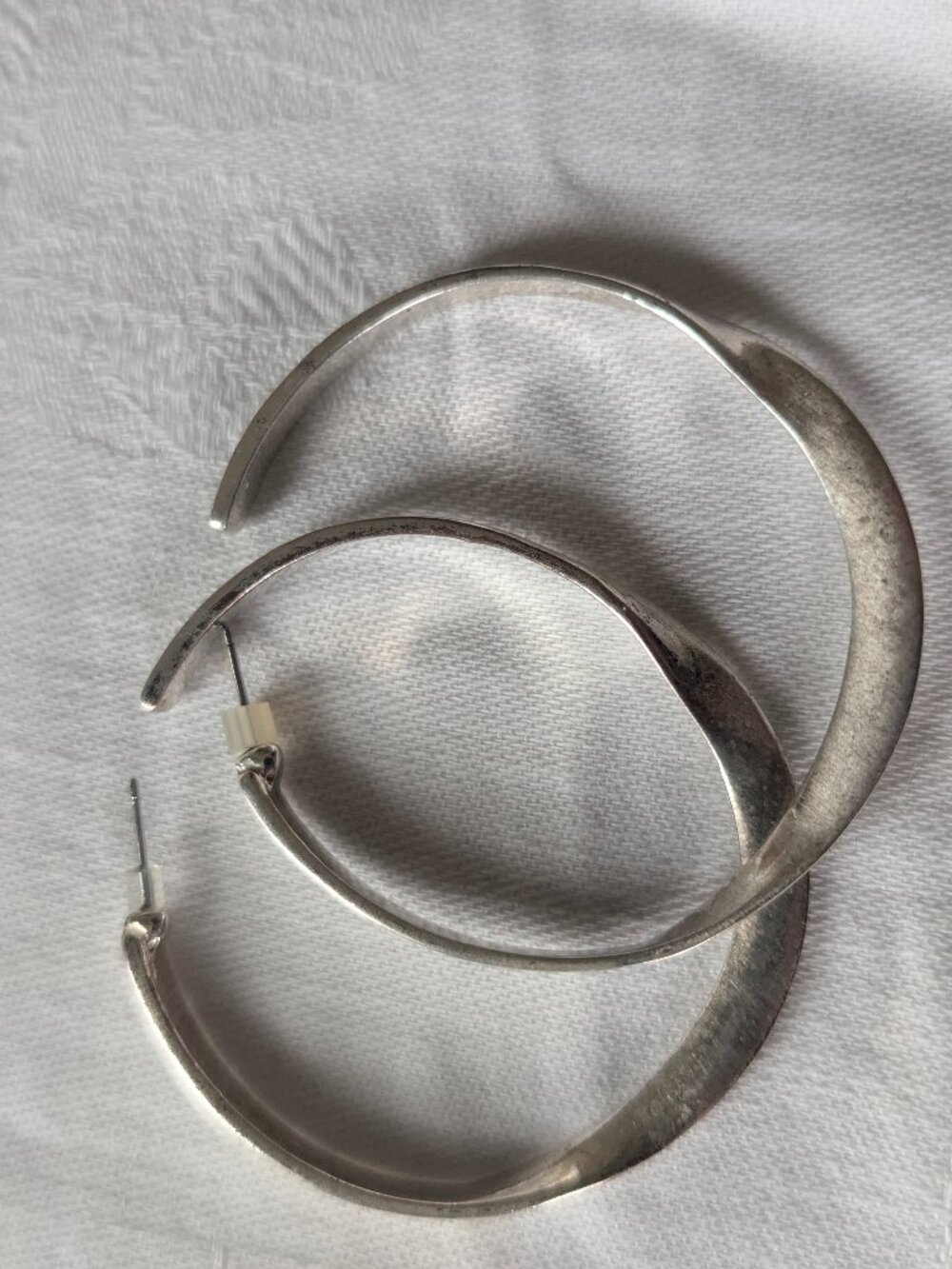 Sculpted Silver Toned 2" Hoop Earrings Twist